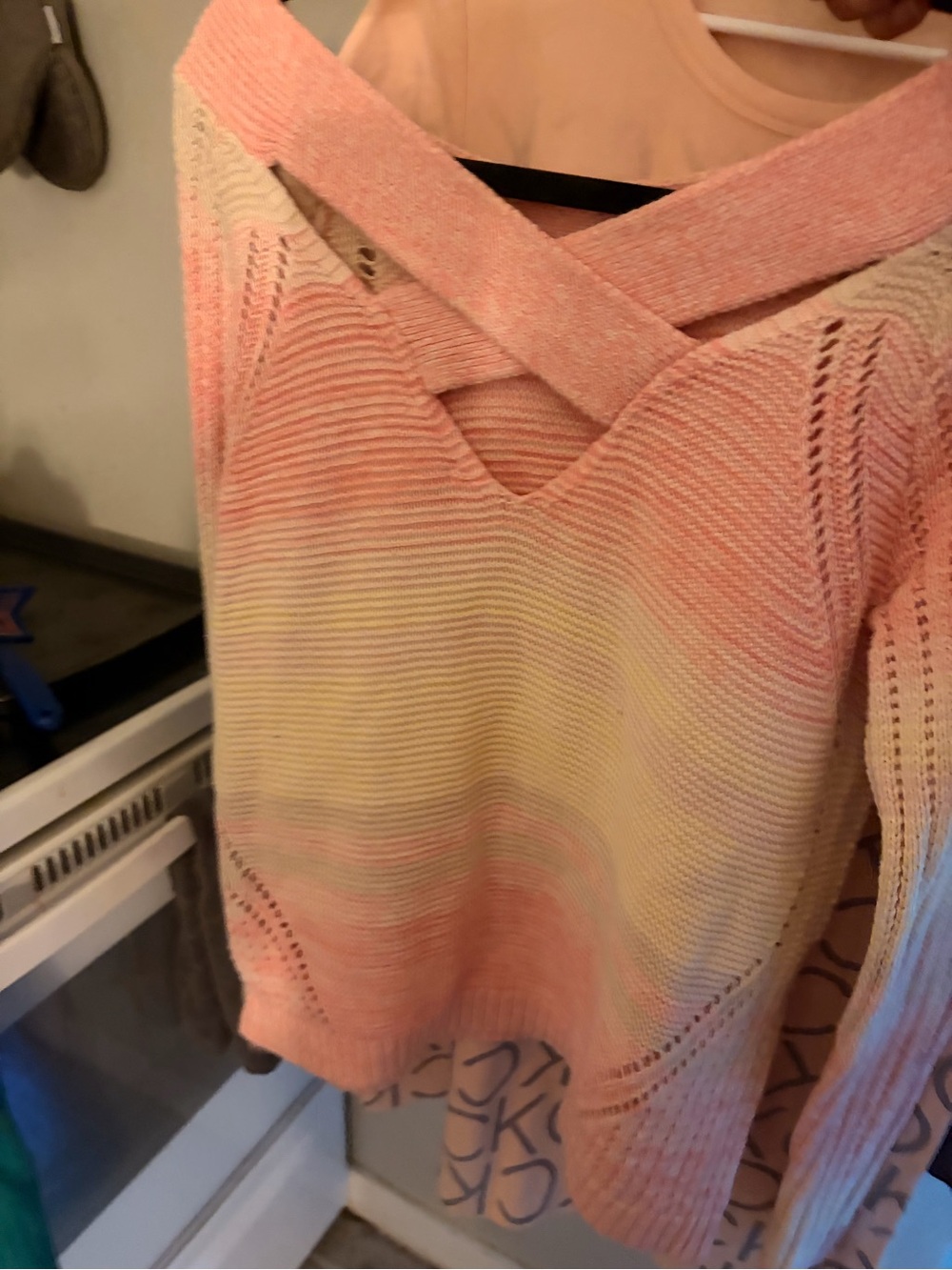 Women’s Pastel Pink Knit Sweater with Cross-Back Detail